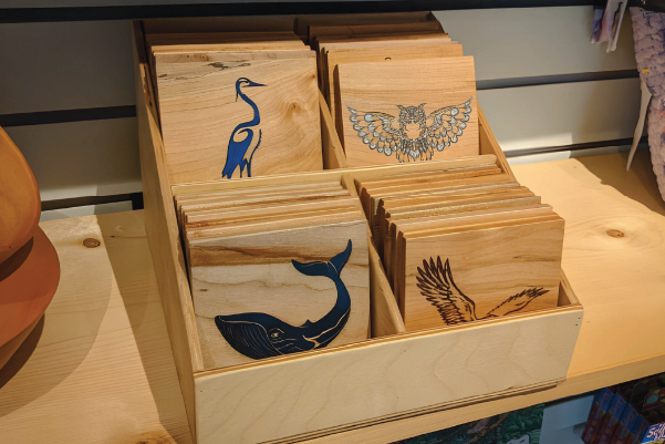 Wooden coasters with wildlife graphics